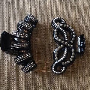 Pair of claw hair clips, black with silver rhinestones. 4 3/“ long.